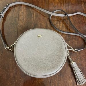 Round, beige Michael Kors crossbody bag
